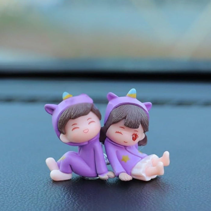 Adorable Couple Miniature Figurines in Purple Unicorn Outfits | Cute Boy & Girl Sitting Pose Showpiece for Car Dashboard, Home Decor, Gifting, Birthday & Anniversary